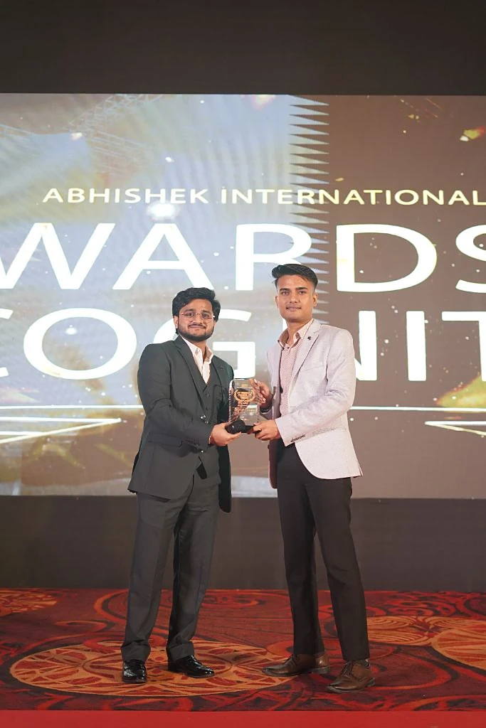 Mujahid Azimabadi presenting a recognition award